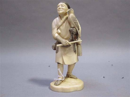 Appraisal: JAPANESE POLYCHROME DECORATED IVORY OKIMONO OF A ROBED MAN th