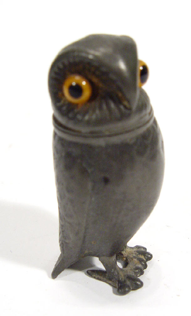 Appraisal: Pewter owl design pepperette with beaded glass eyes cm high