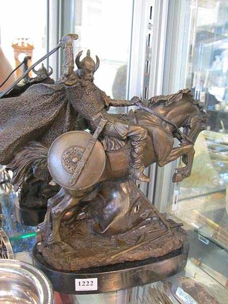 Appraisal: CAST BRONZE VIKING ON HORSE BACK