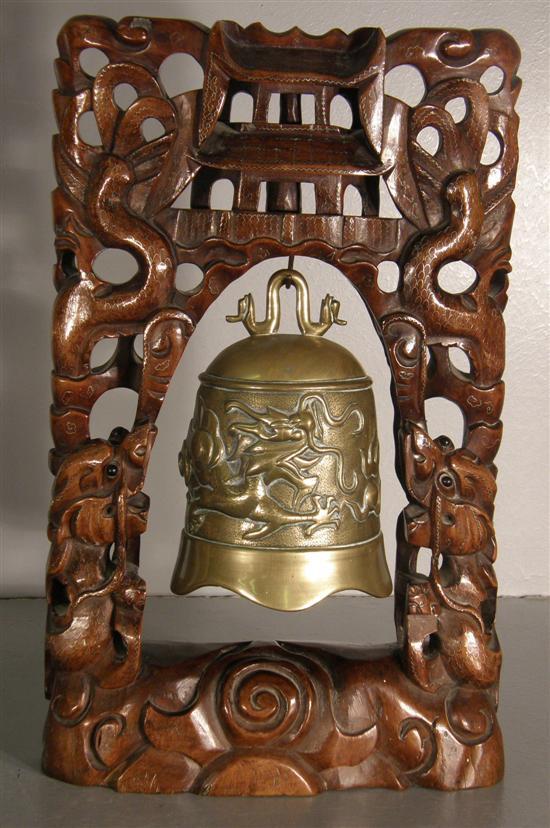 Appraisal: Chinese brass table bell with moulded dragon decoration on a