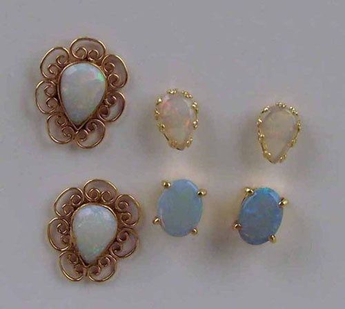 Appraisal: Three pair of yellow gold post earrings with oval and