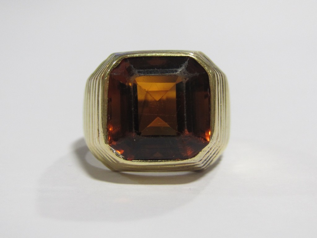 Appraisal: Gold smokey topaz single stone ring with step cut topaz