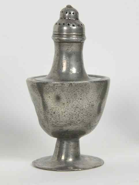 Appraisal: An unusual urn shaped pewter caster circa cm high Literature