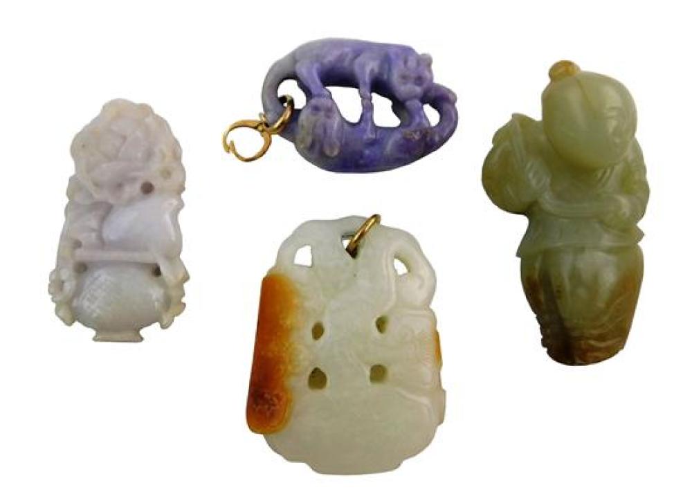 Appraisal: ASIAN Four carved stone pendants and toggles Chinese Qing dynasty