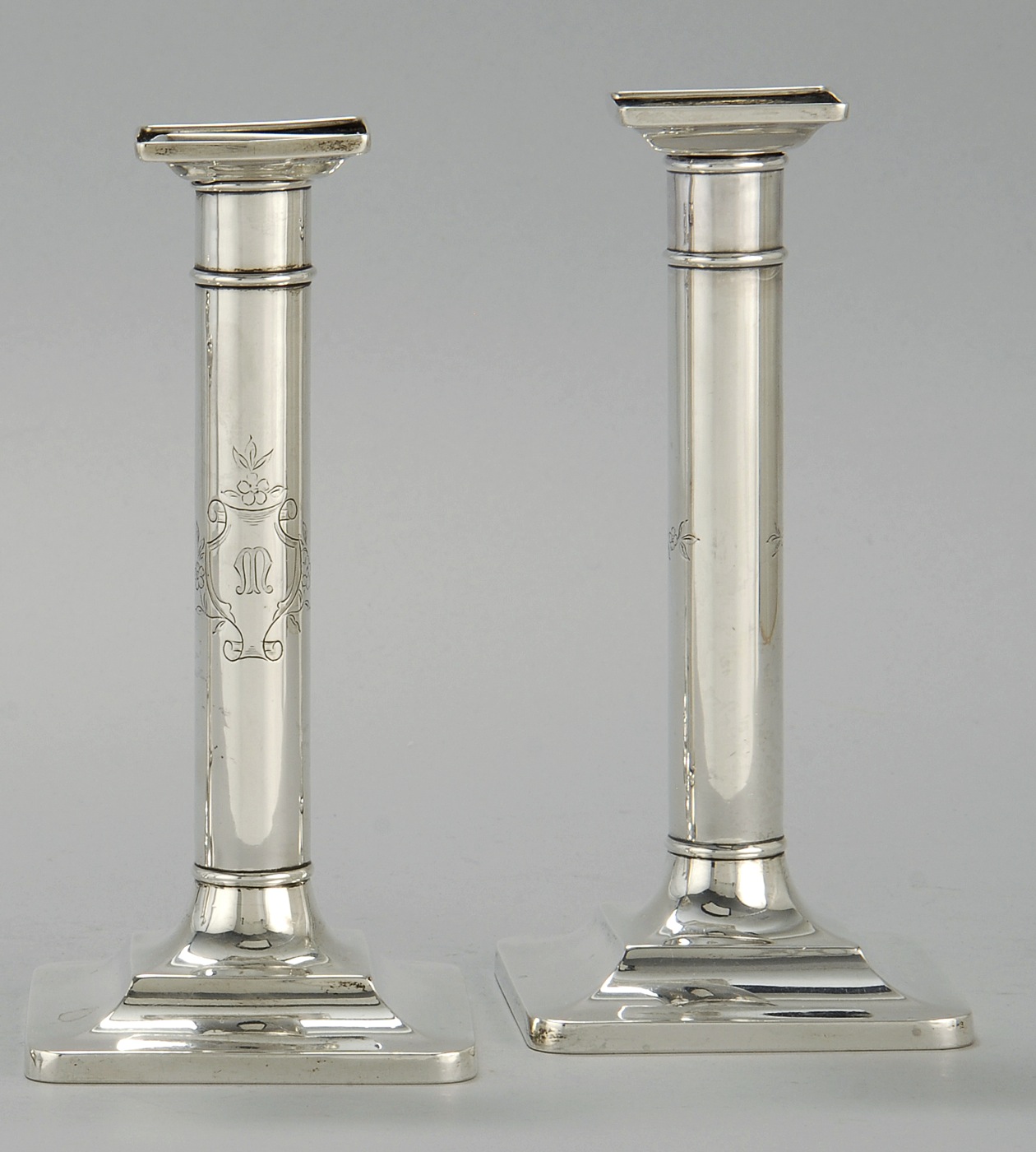 Appraisal: PAIR OF TIFFANY STERLING SILVER CANDLESTICKS In columnar form with