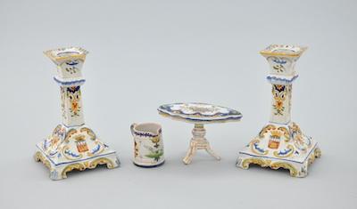 Appraisal: A Pair of French Faience Candle Holders Miniature Table and