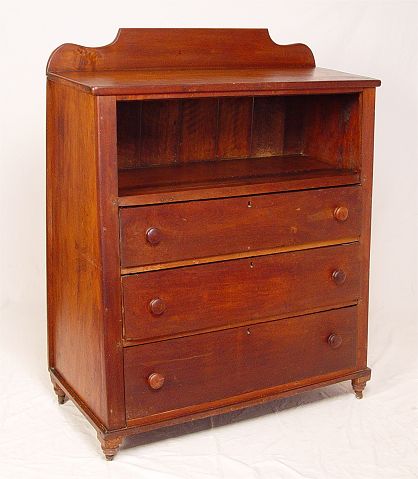 Appraisal: EARLY SHIPS CUPBOARD Open deck over three drawers Angled depth