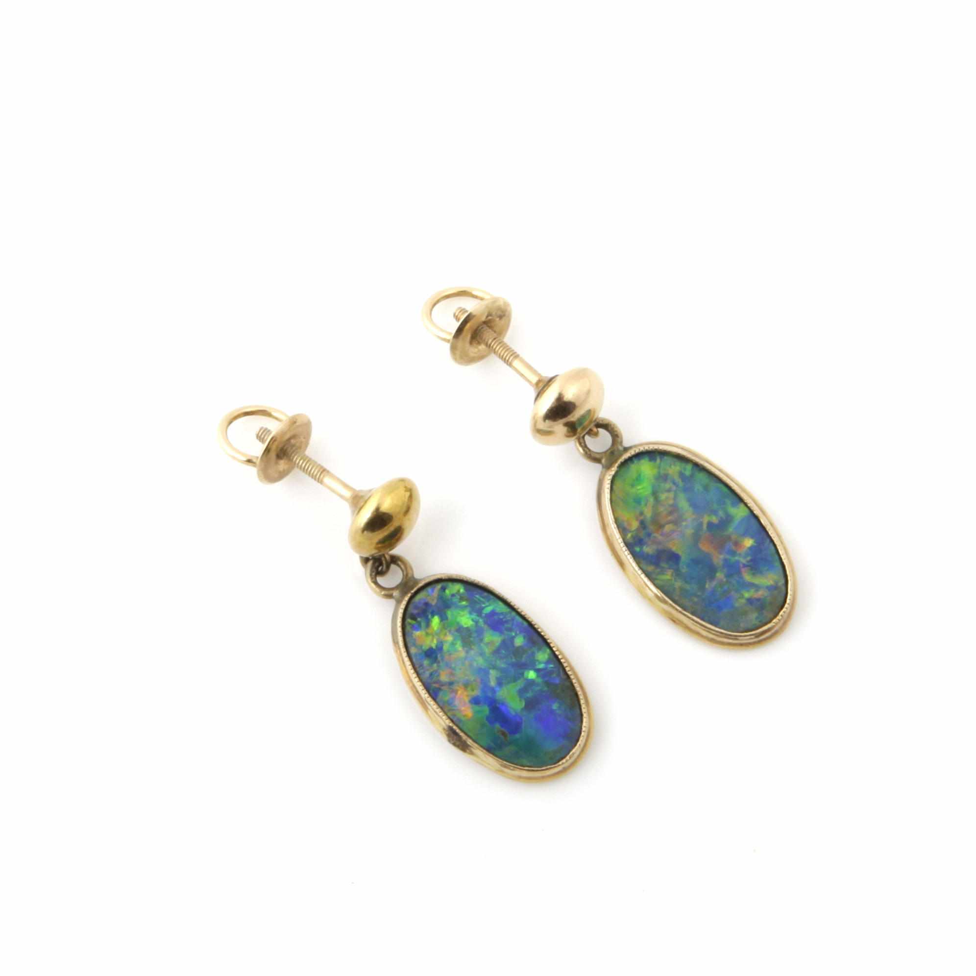 Appraisal: A pair of black opal and gold earrings length in