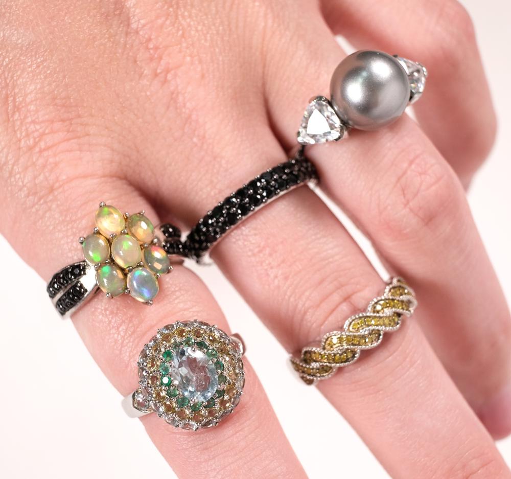 Appraisal: Grouping of five sterling silver rings having multiple gemstones including