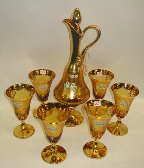 Appraisal: A SEVEN PIECE ITALIAN GOLD AND FLORAL OVERLAY DECANTER SET