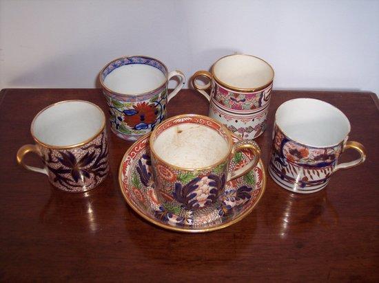 Appraisal: A Wedgwood coffee can and saucer decorated flowers on a