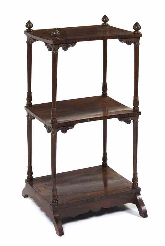 Appraisal: An English Rosewood Whatnot Shelf having turned finials and three