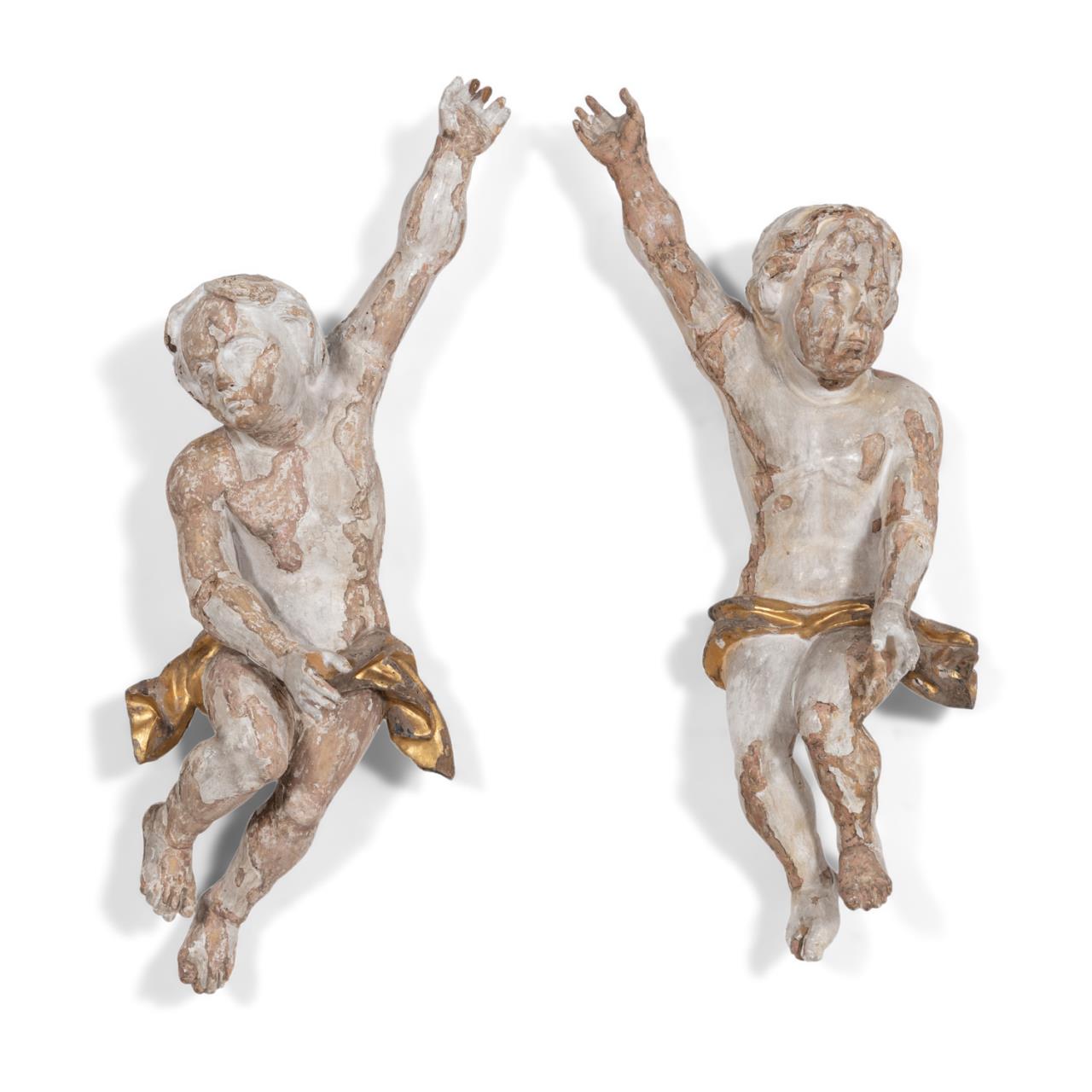 Appraisal: PAIR TH C BAROQUE STYLE PARCEL GILT CHERUBS Pair of