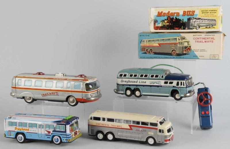 Appraisal: Lot of Tin Bus Battery-Operated Toys Description Japanese Includes two