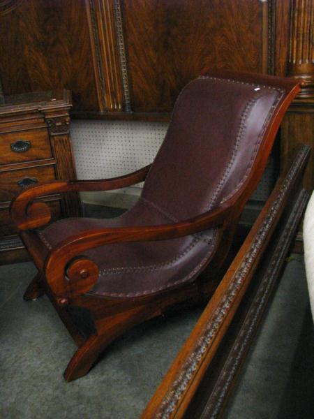 Appraisal: Mahogany Lounge Chair with Leather Seat scroll arm circa -