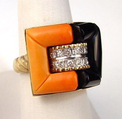 Appraisal: K ONYX CORAL AND DIAMOND RING K yellow gold ring