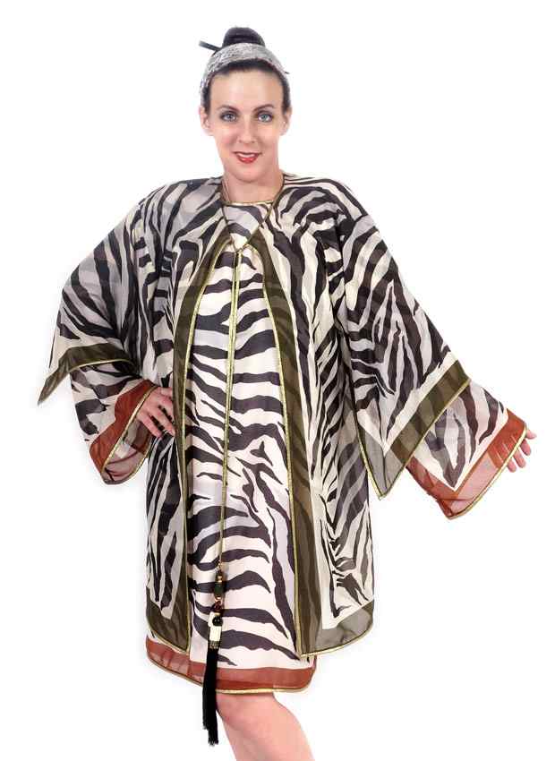 Appraisal: DESIGNER RESORT WEAR IN A ZEBRA PRINT Sheer zebra print