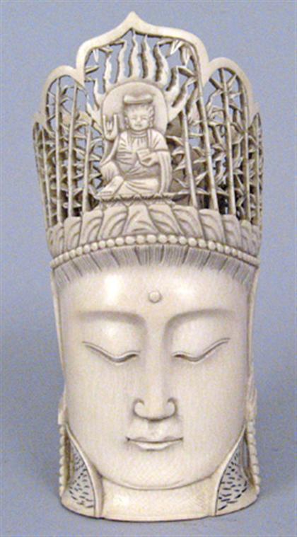 Appraisal: Elephant Ivory head of Quanyin Pieced crown framing a seated