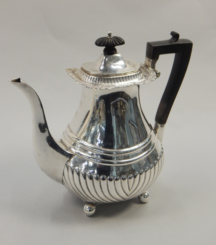 Appraisal: A late Victorian silver coffee pot with part fluted decoration