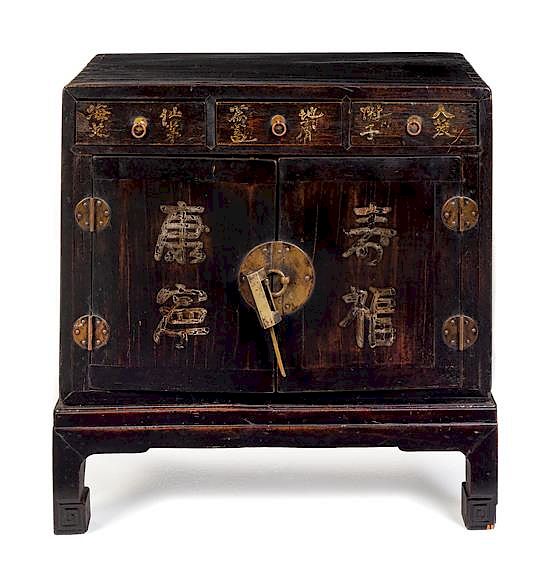 Appraisal: A Chinese Lacquered Apothecary Cabinet Height x width x depth