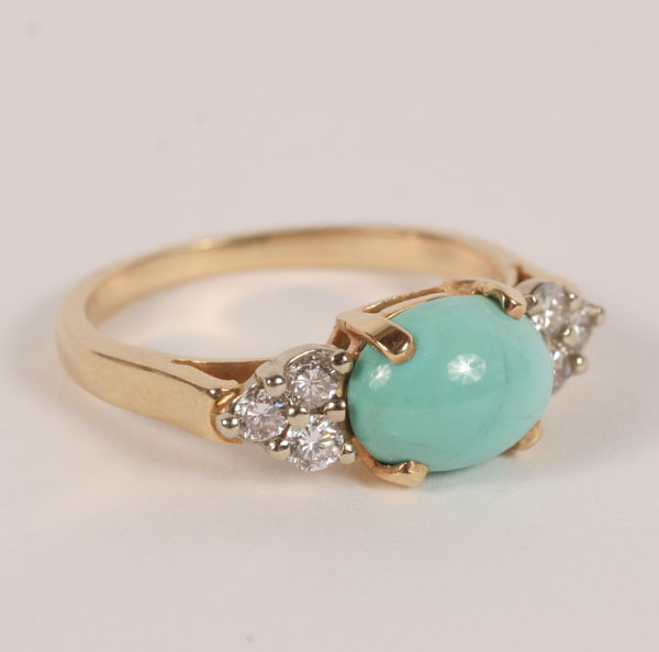 Appraisal: Gold K ring with oval turquoise cabochon measuring mm x