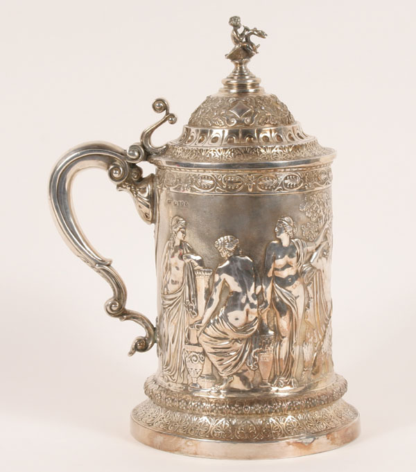 Appraisal: Georgian sterling tankard decorated with various classical figures finial composed