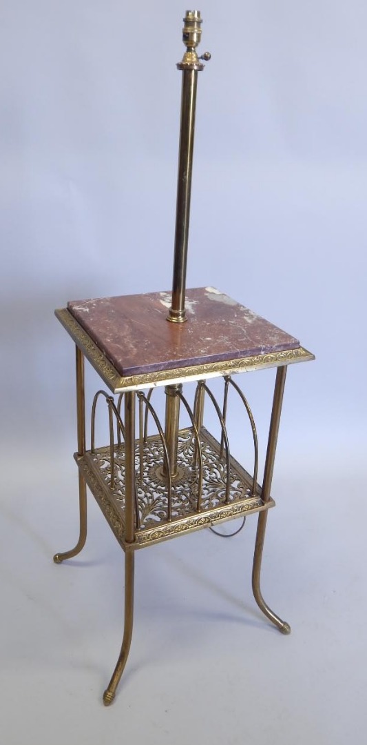 Appraisal: An early thC brass and marble floor lamp with a