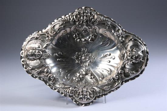 Appraisal: CONTINENTAL SILVER CENTERBOWL th century touchmark maker's mark VL Shaped