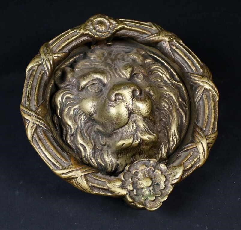 Appraisal: Gilt bronze lion head door knocker Relief floral knocking ring