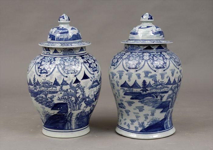 Appraisal: Two Chinese Blue and White Pottery Covered Jars in in