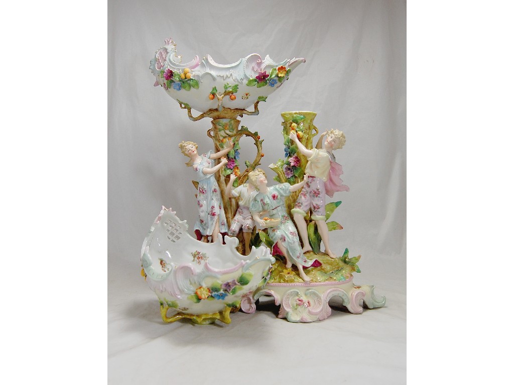 Appraisal: Pair of German porcelain ornate comports modelled with young couples