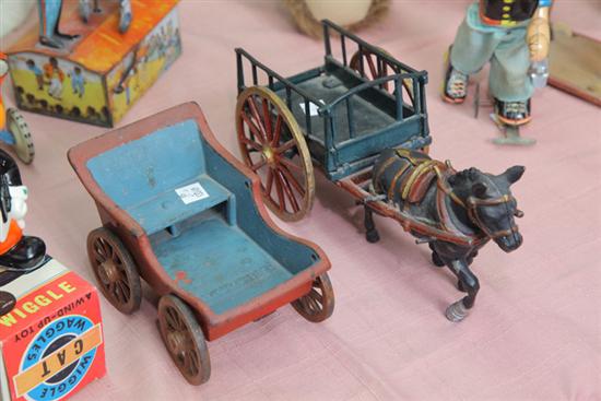 Appraisal: TWO CAST IRON TOYS - DONKEY PULLING A CART AND