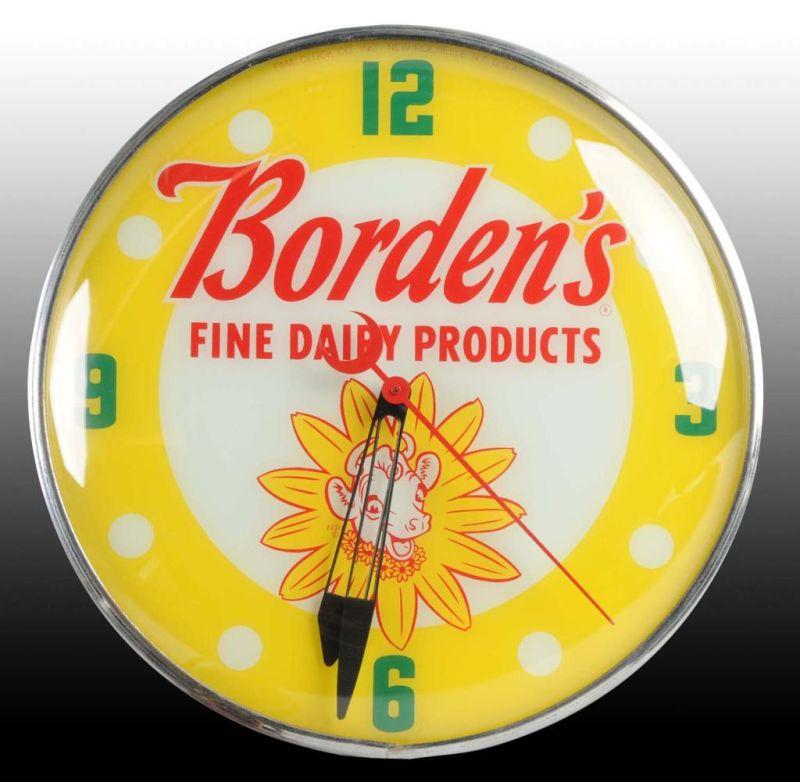 Appraisal: Borden's Dairy Products Electric Light-Up Clock Description Marked Pam Lights