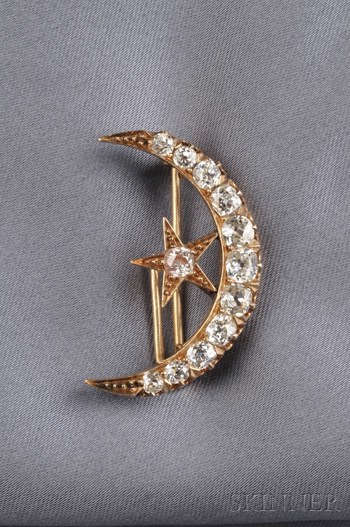 Appraisal: Antique kt Gold and Diamond Crescent Brooch with star motif