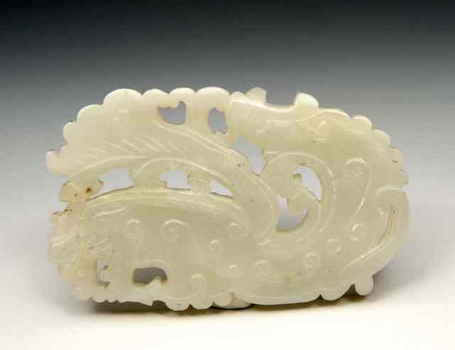 Appraisal: A CHINESE JADE PENDANT carved in the form of a