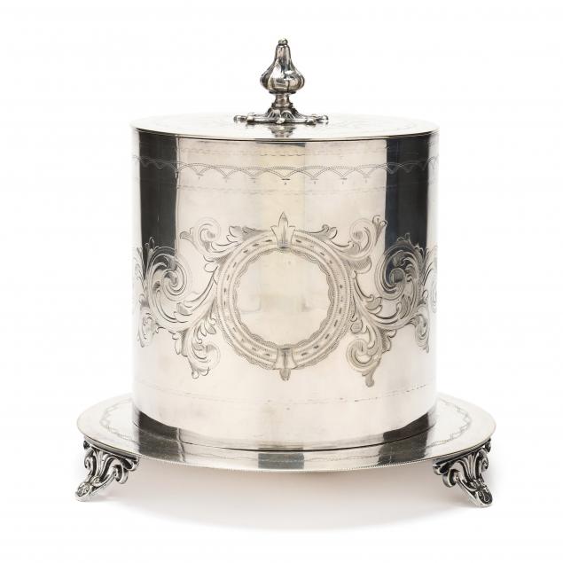 Appraisal: VICTORIAN SILVERPLATE BISCUIT BOX Circa mark of Naylor Clark Co