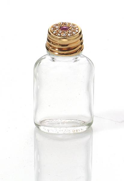 Appraisal: A diamond ruby and k gold capped bottle