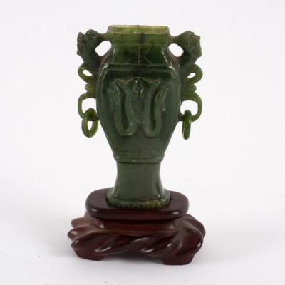 Appraisal: A Chinese spinach jade urn of square baluster section with