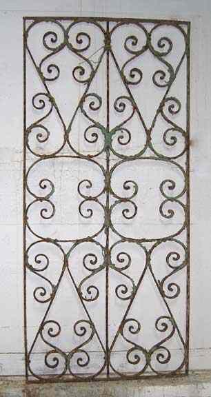 Appraisal: A Painted Wrought Iron Window Grill circa having scrolling design