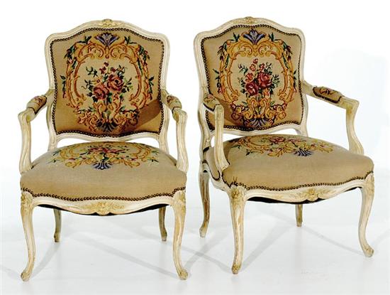 Appraisal: Pair Louis XV style painted fauteuils early th century needlework