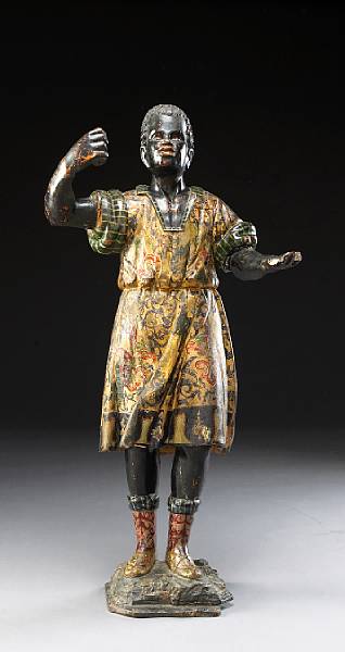 Appraisal: An Italian polychrome and parcel gilt carved blackamoor th century