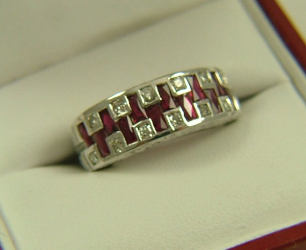 Appraisal: RUBY AND DIAMOND RING K white gold setting set with