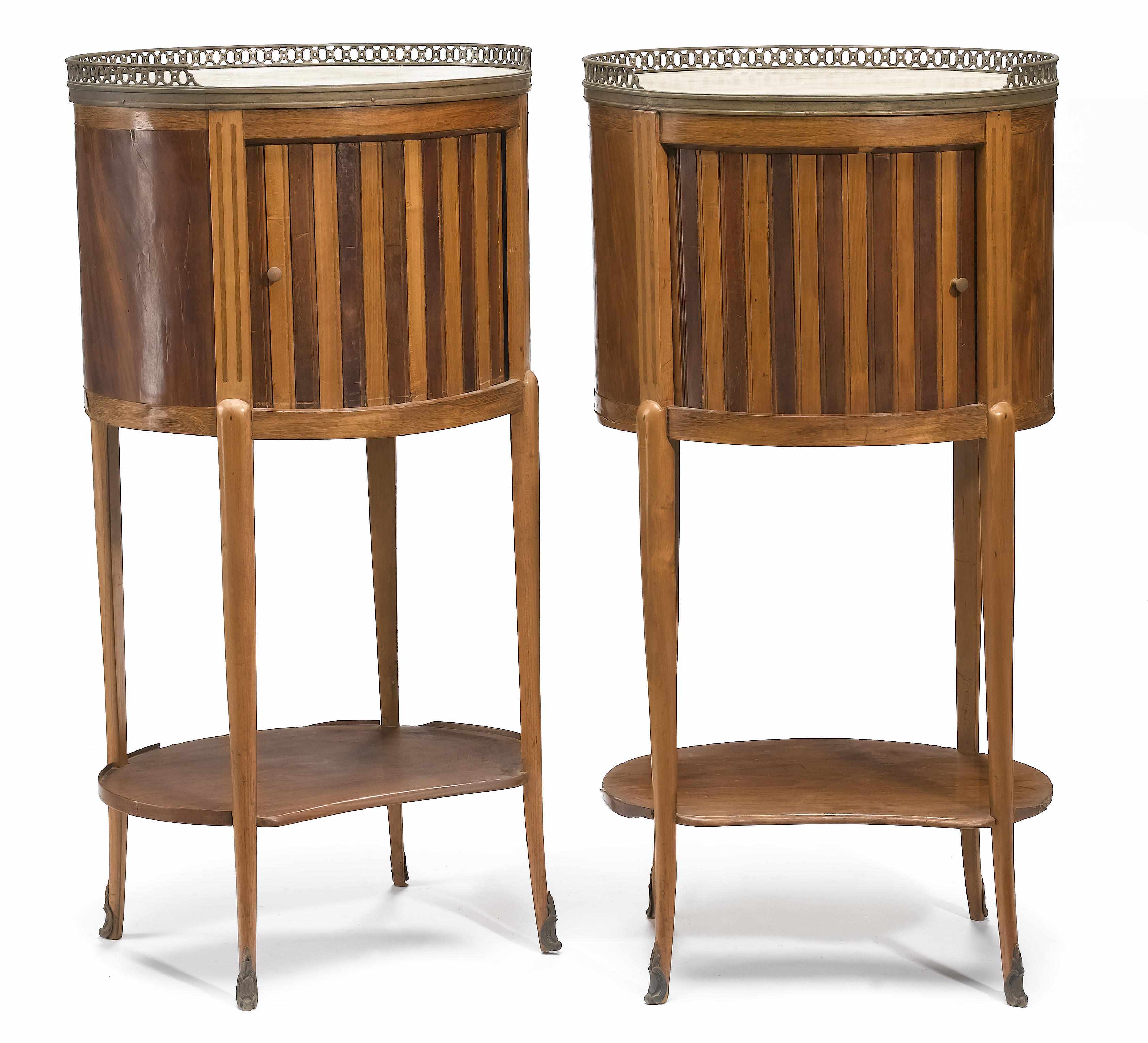 Appraisal: A pair of Continental Neoclassical mahogany and maple bedside cupboards