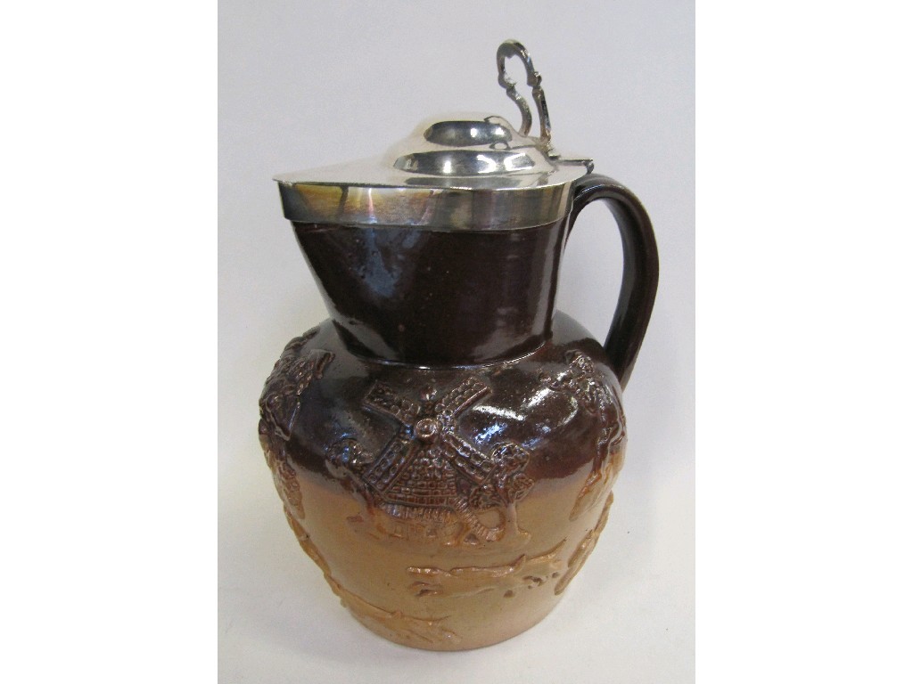 Appraisal: Salt glazed stoneware jug with silver lid and mount