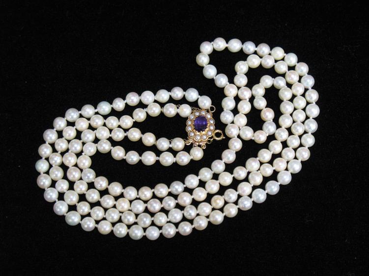 Appraisal: A DOUBLE ROW CULTURED PEARL NECKLACE the yellow metal clasp