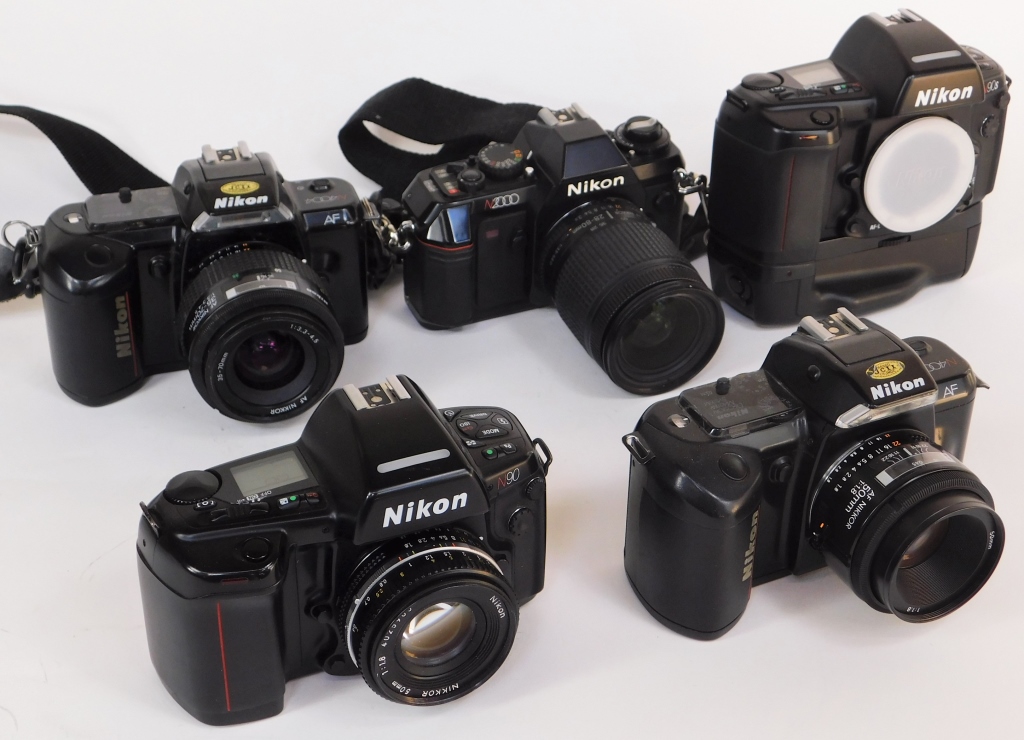 Appraisal: GROUP OF NIKON SLR CAMERAS Group of Nikon SLR cameras