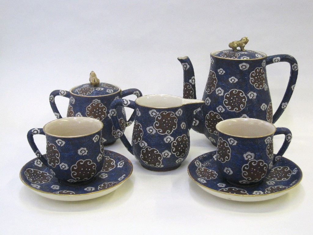 Appraisal: Japanese Satsuma tea for two with blue swirl and floral