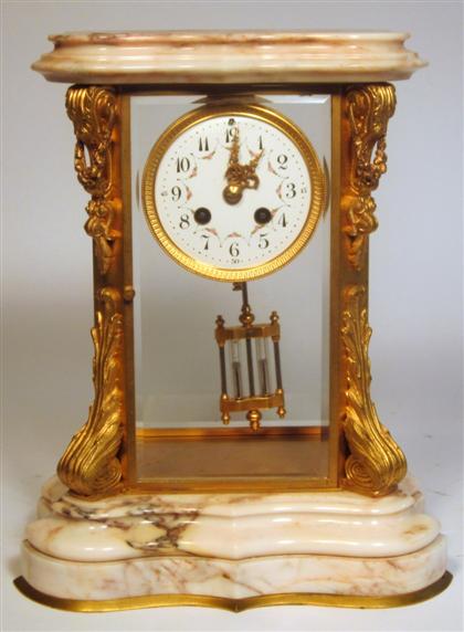 Appraisal: French gilt bronze and marble mantel clock early th century