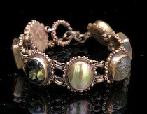 Appraisal: Stephen Dweck Shell Jade and Quartz Link Bracelet A bronze