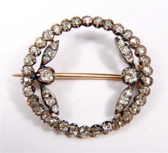 Appraisal: A VICTORIAN DIAMOND SET OPEN OVAL BROOCH with diamond set